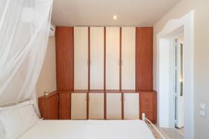 A bed or beds in a room at Liogerma Resorts
