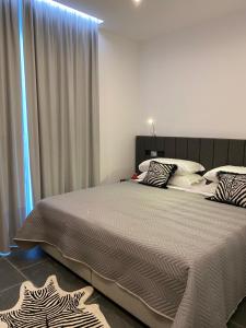 Postel nebo postele na pokoji v ubytování B&B Maria