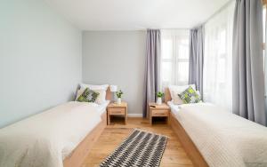 Posteľ alebo postele v izbe v ubytovaní Apartament Karkonoskie Tarasy