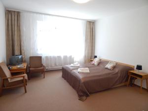 Μια τηλεόραση ή/και κέντρο ψυχαγωγίας στο Apartmány Vila Juraj
