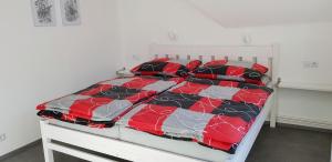 Postel nebo postele na pokoji v ubytování Pension Apartmány Harrachov 288