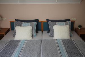 Postel nebo postele na pokoji v ubytování Apartman Villa Magdalena
