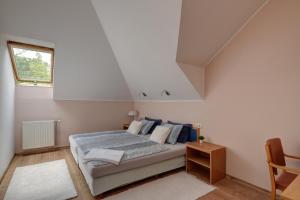 Postel nebo postele na pokoji v ubytování Apartman Villa Magdalena