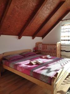 Postel nebo postele na pokoji v ubytování Guesthouse Madzarevic