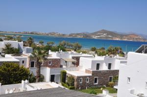 a view of white buildings and the ocean at Sea View Casa in Naxos Chora