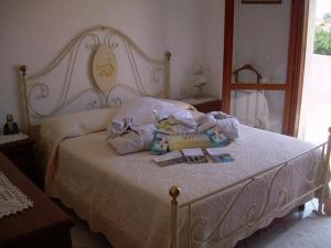 Ένα ή περισσότερα κρεβάτια σε δωμάτιο στο Ariedo Bed And Breakfast