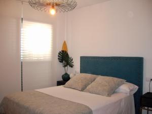 Posteľ alebo postele v izbe v ubytovaní Residencial Dulcinea - Chalet
