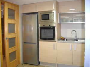 Kuchyňa alebo kuchynka v ubytovaní Residencial Dulcinea - Chalet