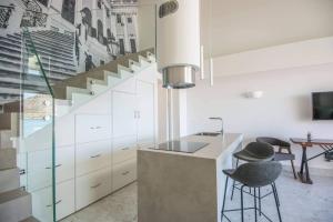 Кухня или мини-кухня в Nama Sea Side Suites
