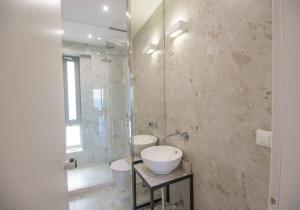 Ванная комната в Nama Sea Side Suites