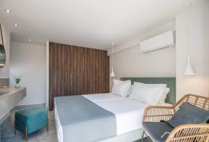 Кровать или кровати в номере Nama Sea Side Suites