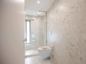 Ванная комната в Nama Sea Side Suites