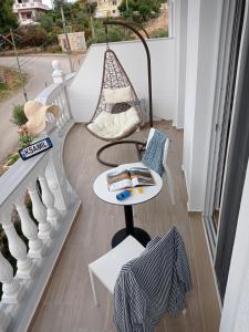 Balkón nebo terasa v ubytování Vasiliu Boutique Hotel Ksamil