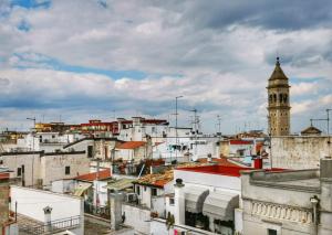 a view of a city with a clock tower at Ciacco Hotel in Gioia del Colle