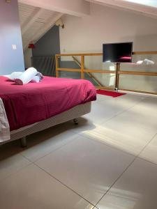 Voodi või voodid majutusasutuse CHALET JANET toas