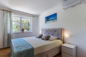 Postel nebo postele na pokoji v ubytování Villa Ana + 37 fotografií