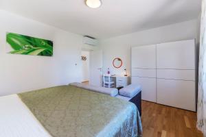 Posteľ alebo postele v izbe v ubytovaní Villa Ana