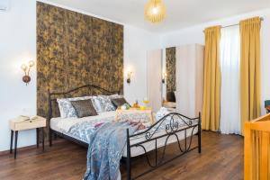 Een bed of bedden in een kamer bij Apartments Vesna