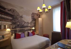 Postel nebo postele na pokoji v ubytování Best Western Plus Monopole Métropole