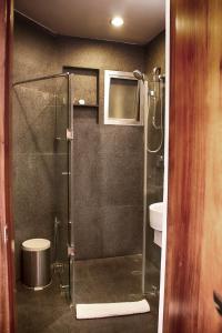 Ванная комната в Suites Aura For Living