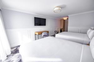 Postel nebo postele na pokoji v ubytování Comfort Inn Towradgi Beach