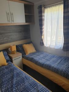 Postel nebo postele na pokoji v ubytování Luxury Latest Model Holiday Home
