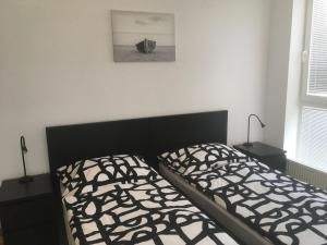 Postel nebo postele na pokoji v ubytování Penzion Lokotka Děčín