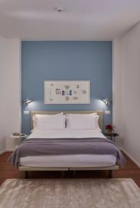 Ліжко або ліжка в номері Ariosto Social Club