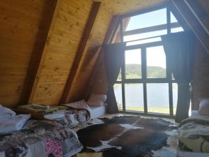 Llit o llits en una habitació de Vikendica Ines