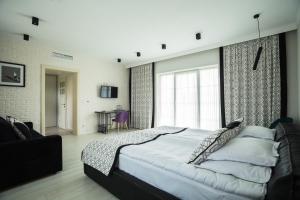Posteľ alebo postele v izbe v ubytovaní Publo Spa Hotel