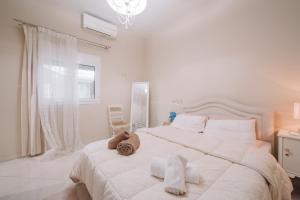 Postel nebo postele na pokoji v ubytování Debbies House