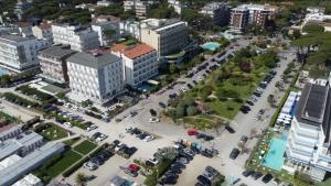 an aerial view of a city with a parking lot at Golf & Beach Hotel B&B in Milano Marittima