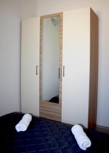 Postel nebo postele na pokoji v ubytování Oliven Garden