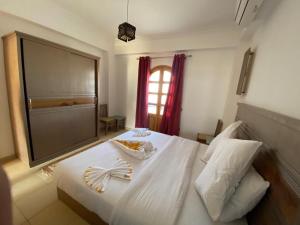 Cama ou camas em um quarto em Villa 22