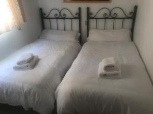 Ένα ή περισσότερα κρεβάτια σε δωμάτιο στο Conde Collection Matalascañas Doñana