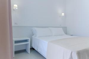 Postel nebo postele na pokoji v ubytování Smart Hotel Ugento