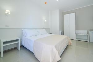 Postel nebo postele na pokoji v ubytování Smart Hotel Ugento