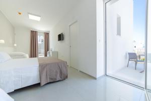 Postel nebo postele na pokoji v ubytování Smart Hotel Ugento