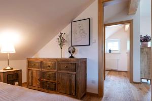 Postel nebo postele na pokoji v ubytování Ferienwohnung Flora Altaussee