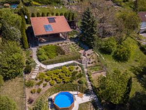 an overhead view of a house with a garden at Sunset Hill Vendégház Zebegény in Zebegény
