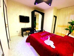 Łóżko lub łóżka w pokoju w obiekcie Hotel Napoleon-Cuore