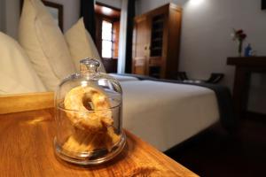 Łóżko lub łóżka w pokoju w obiekcie Hotel Escuela Rural Casa Los Herrera