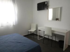 Postel nebo postele na pokoji v ubytování Josefina Bed & Breakfast