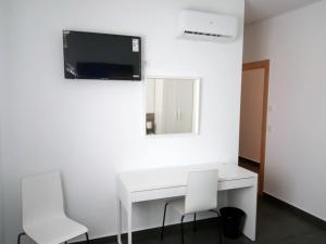 TV a/nebo společenská místnost v ubytování Josefina Bed & Breakfast