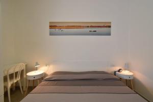 Postel nebo postele na pokoji v ubytování Hotel Zanin
