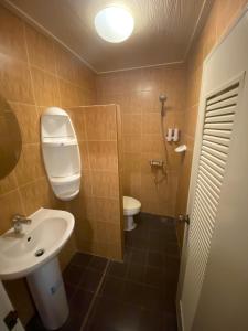 Koupelna v ubytování Star Guesthouse + 37 fotografií