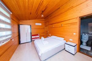 Кровать или кровати в номере Ikiz Villas