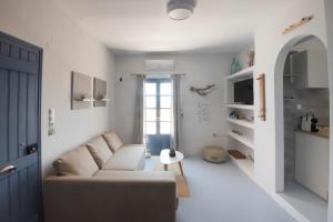 Posedenie v ubytovaní THALASSA Seafront Superb 1BD house in Naousa