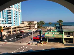 a view from a window of a city with a street at El Dorado in Myrtle Beach