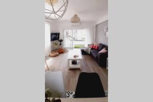 Posezení v ubytování Acogedor y luminoso apartamento con vistas al mar